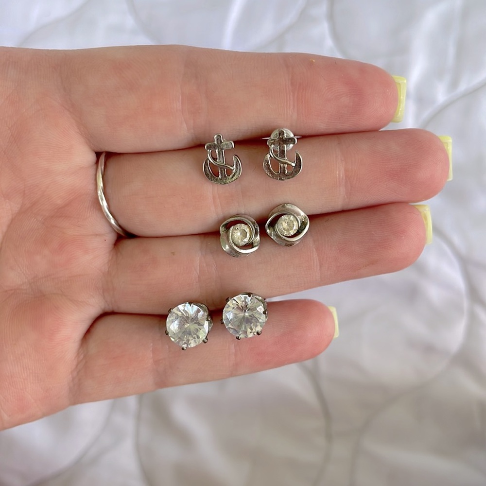 Silver earrings. Anchors, diamond roses, diamond studs.
